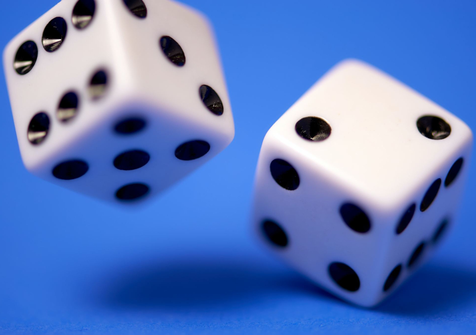 Photo of two rolling dice